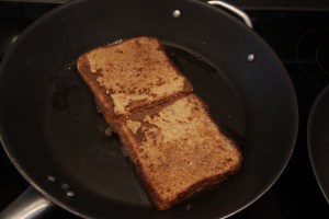 Two French toasts in pan