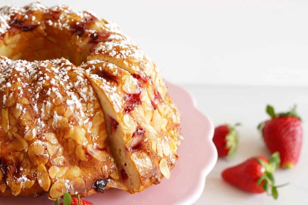 Moist, light and fresh, this Austrian Topfen & Strawberry Gugelhupf Cake is irresistable! If you love moist cakes full of aroma, you have to try this recipe!
