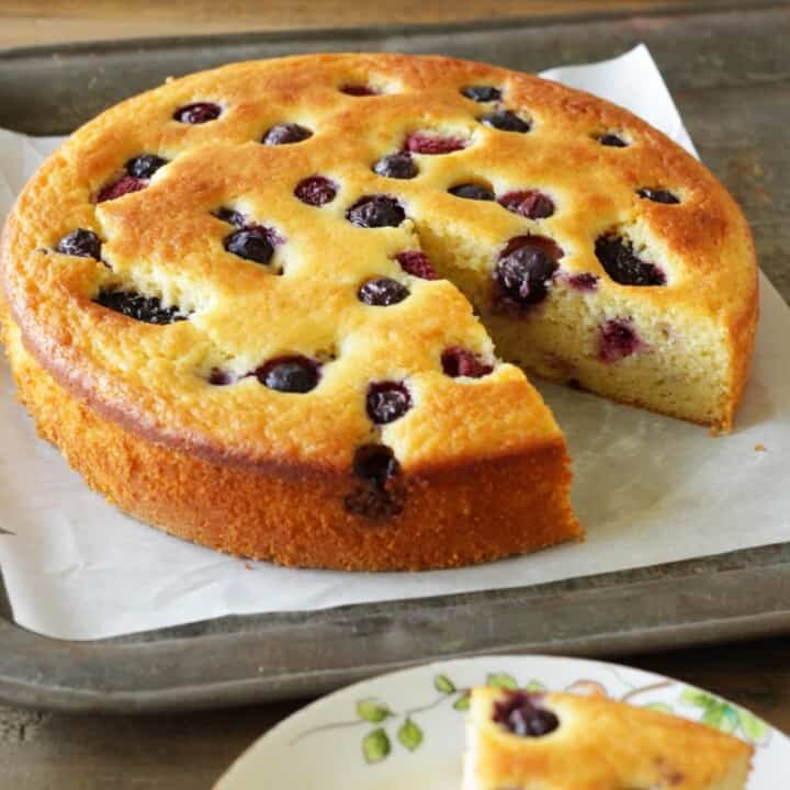 Lemon Olive Oil Cake with Berries - Living on Cookies