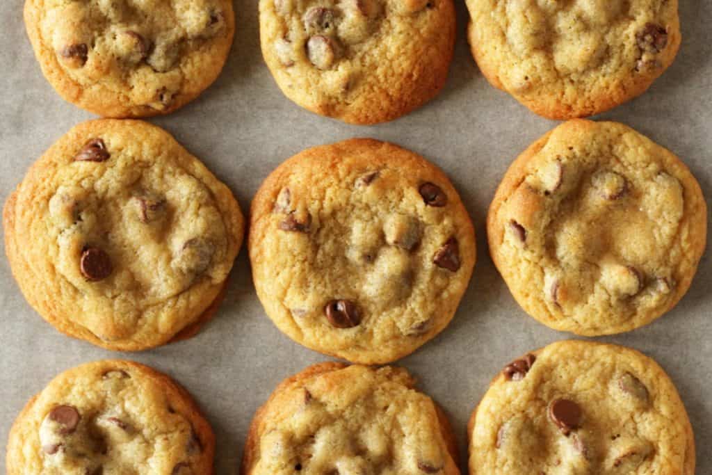 Chocolate Chip Cookies are the easiest thing in the world to bake and anyone can bake them! This post is about explaining which ingredients to use and giving you clear and concise instructions so that your cookies are the best American bakery-style chocolate chip cookies cookies too!