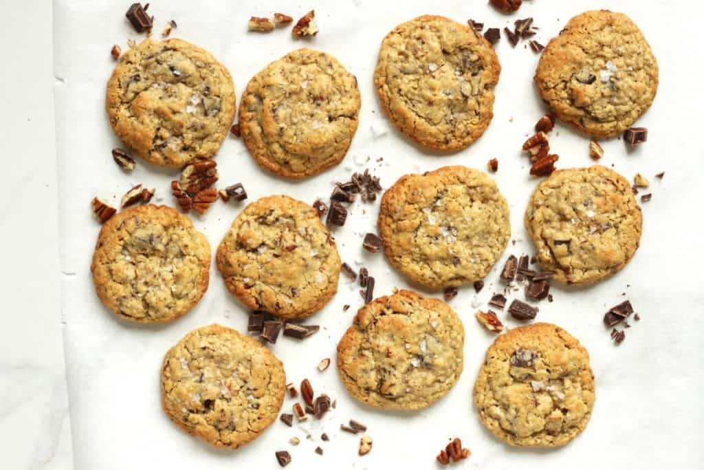 Cowboy Cookies are made with real chopped chocolate, oatmeal, shredded coconut and pecans. They are thick, soft and chewy. You will love these cookies.