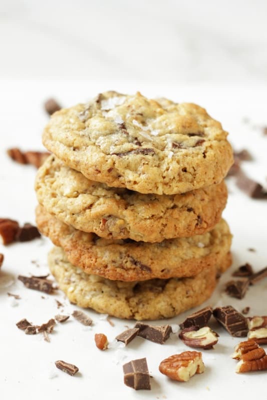 Cowboy Cookies are made with real chopped chocolate, oatmeal, shredded coconut and pecans. They are thick, soft and chewy. You will love these cookies.